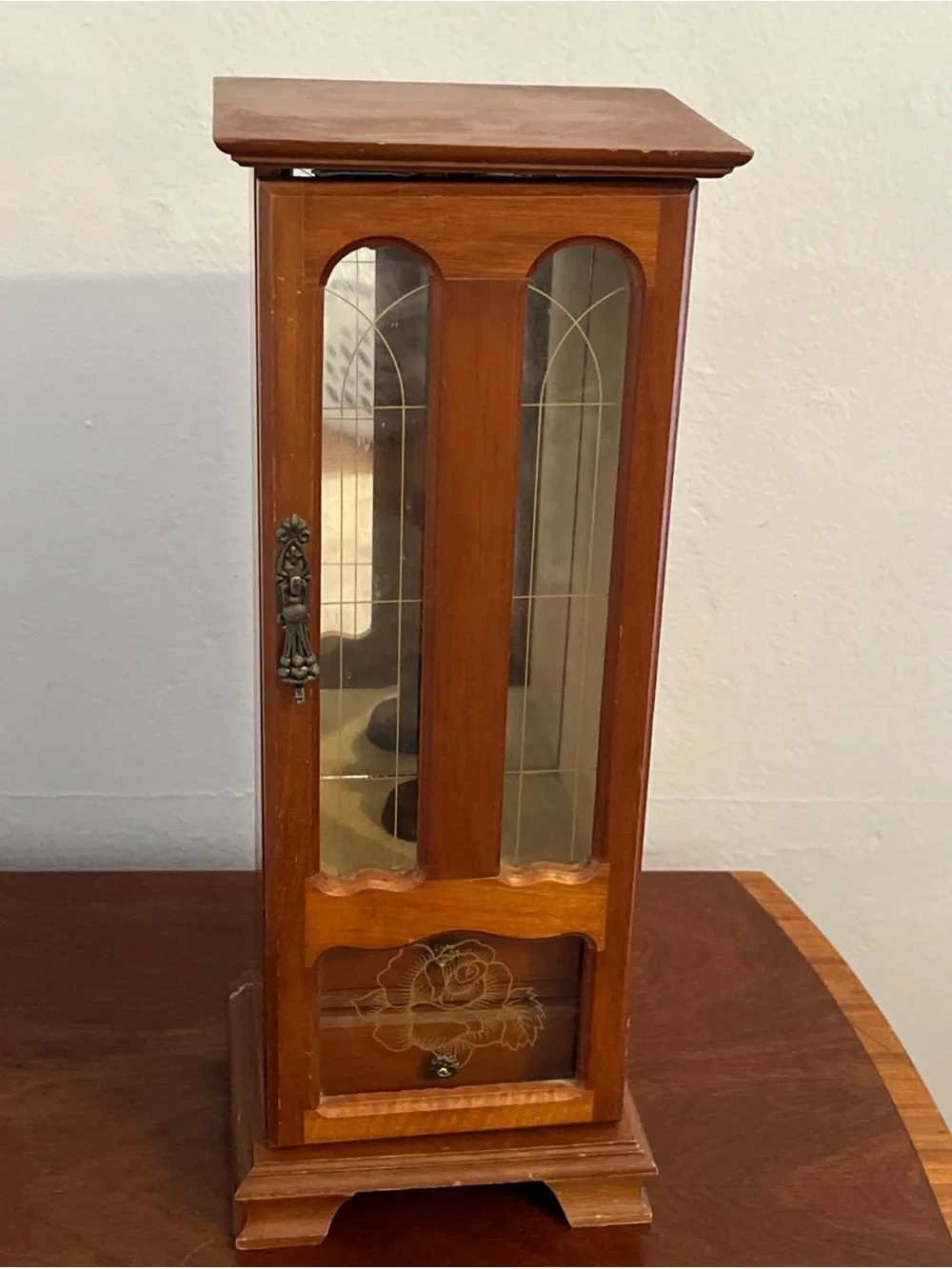 Vintage Tall Wooden Jewelry Armoire with Glass Front and Rose Detail